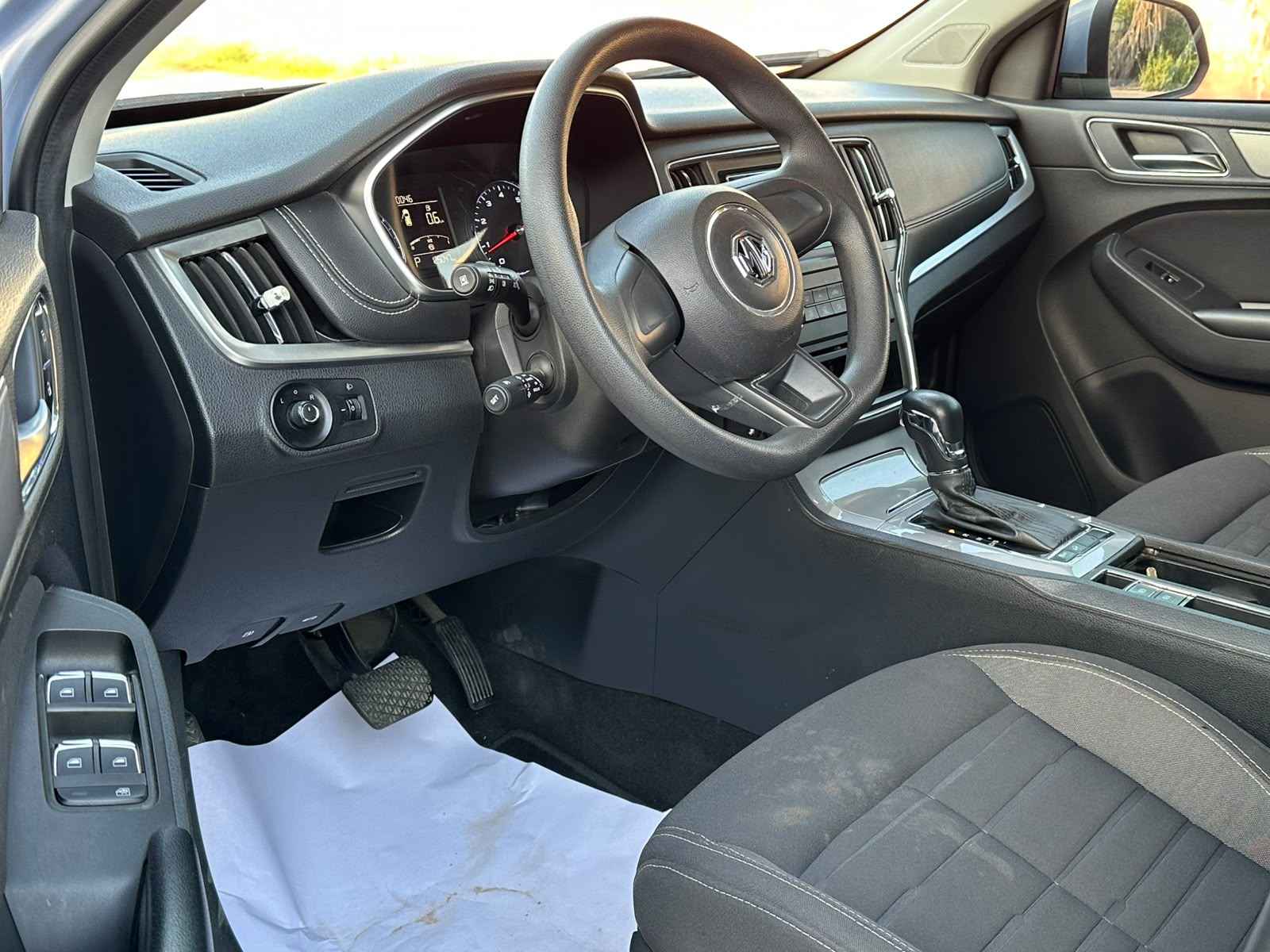 MG